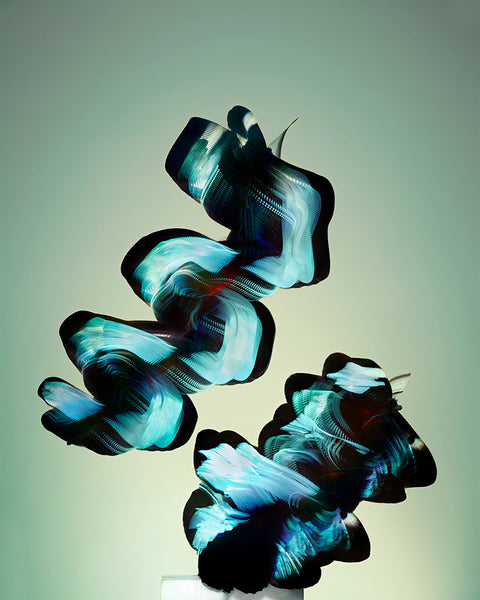 Entomography #536, Heliconius Sapho, 2022 by Xavi Bou showcases abstract shapes resembling swirling blue and black clouds against a light green backdrop, evoking the dynamic flight of an insect.